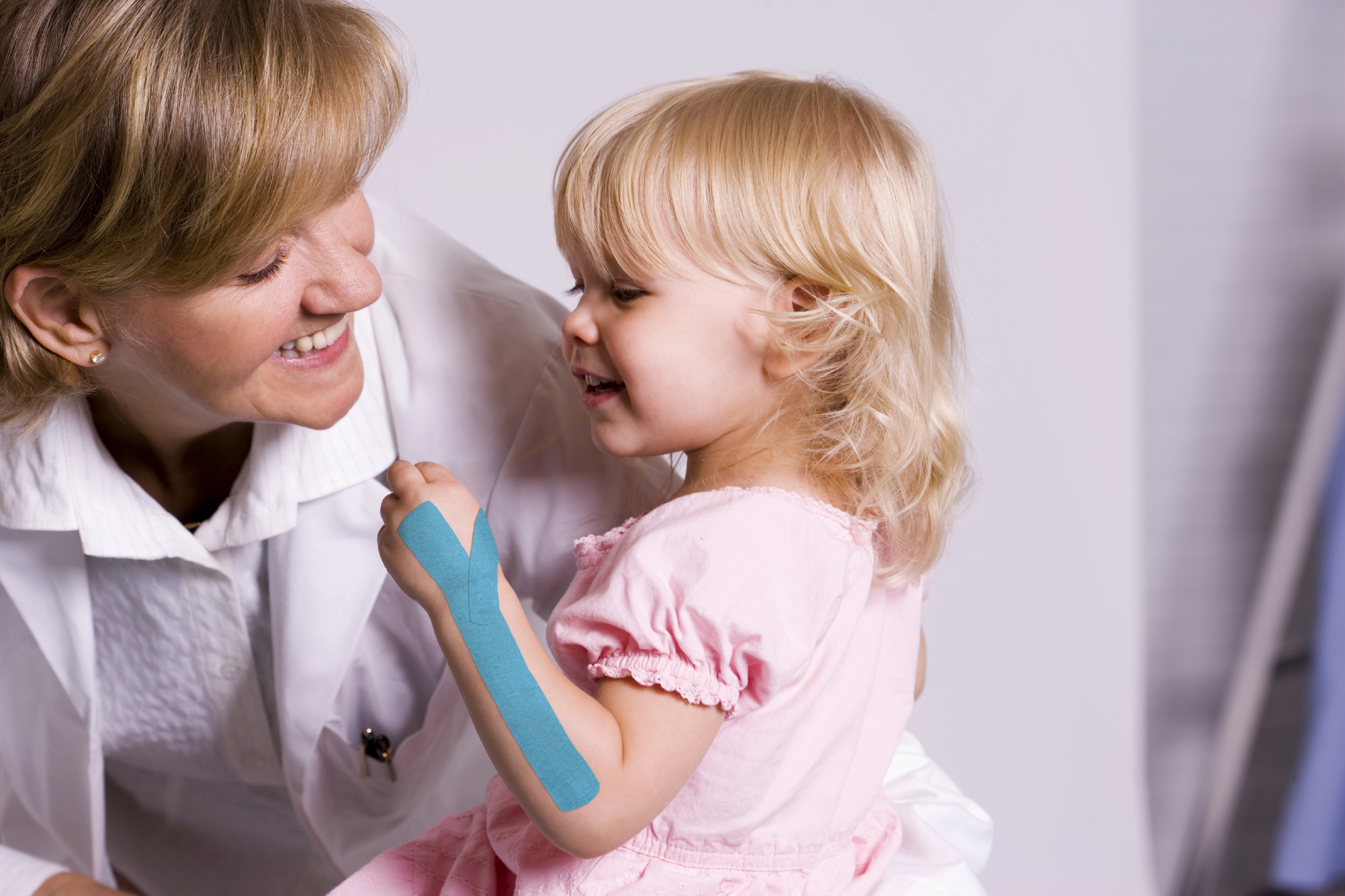 Evidence-Based Kinesiology Taping for Pediatrics